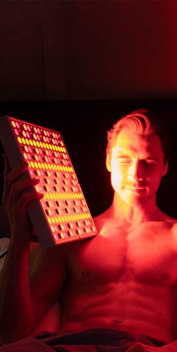 Image of man using Red Light Therapy